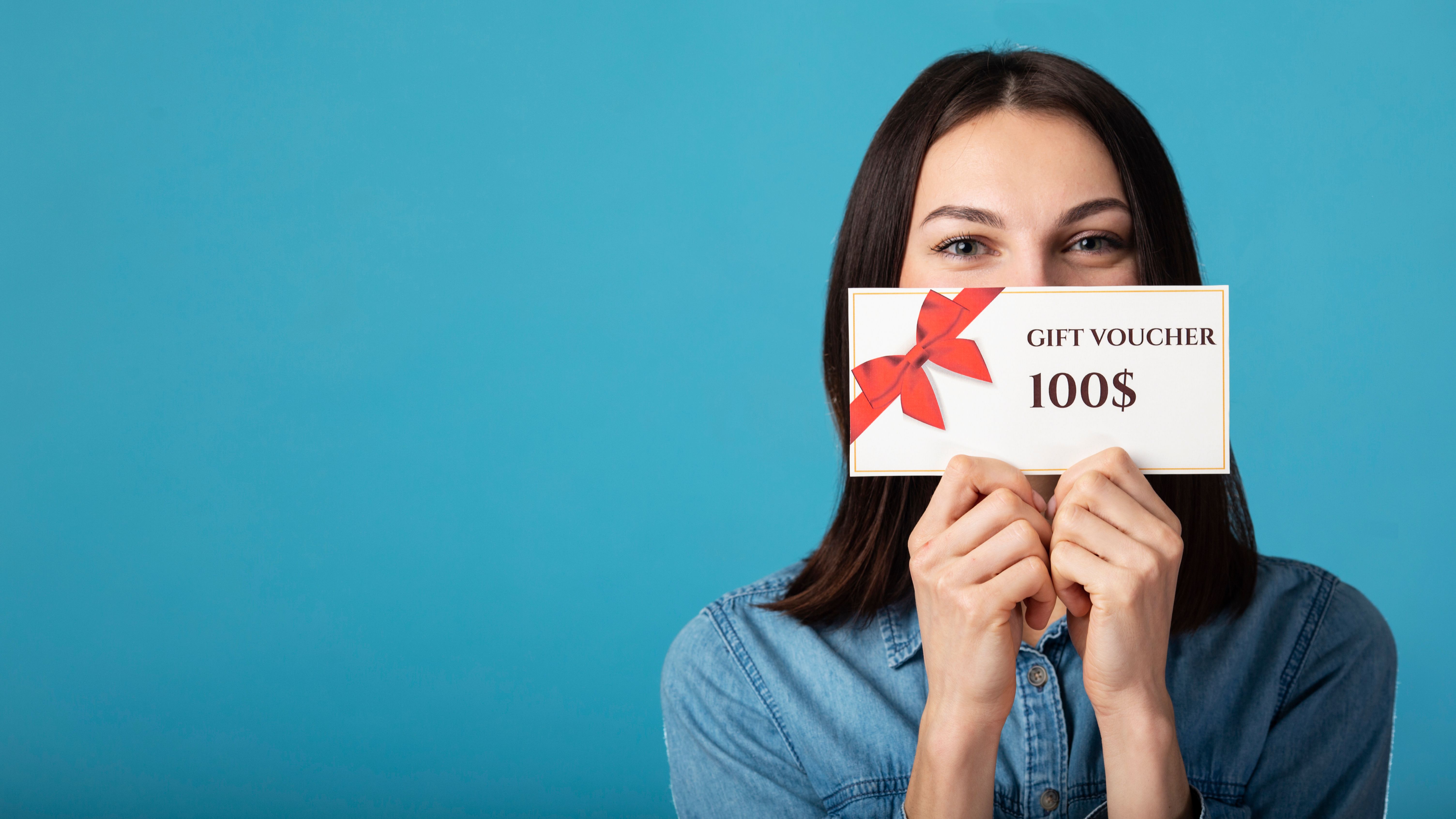 beautiful-gift-voucher-with-hand.jpg