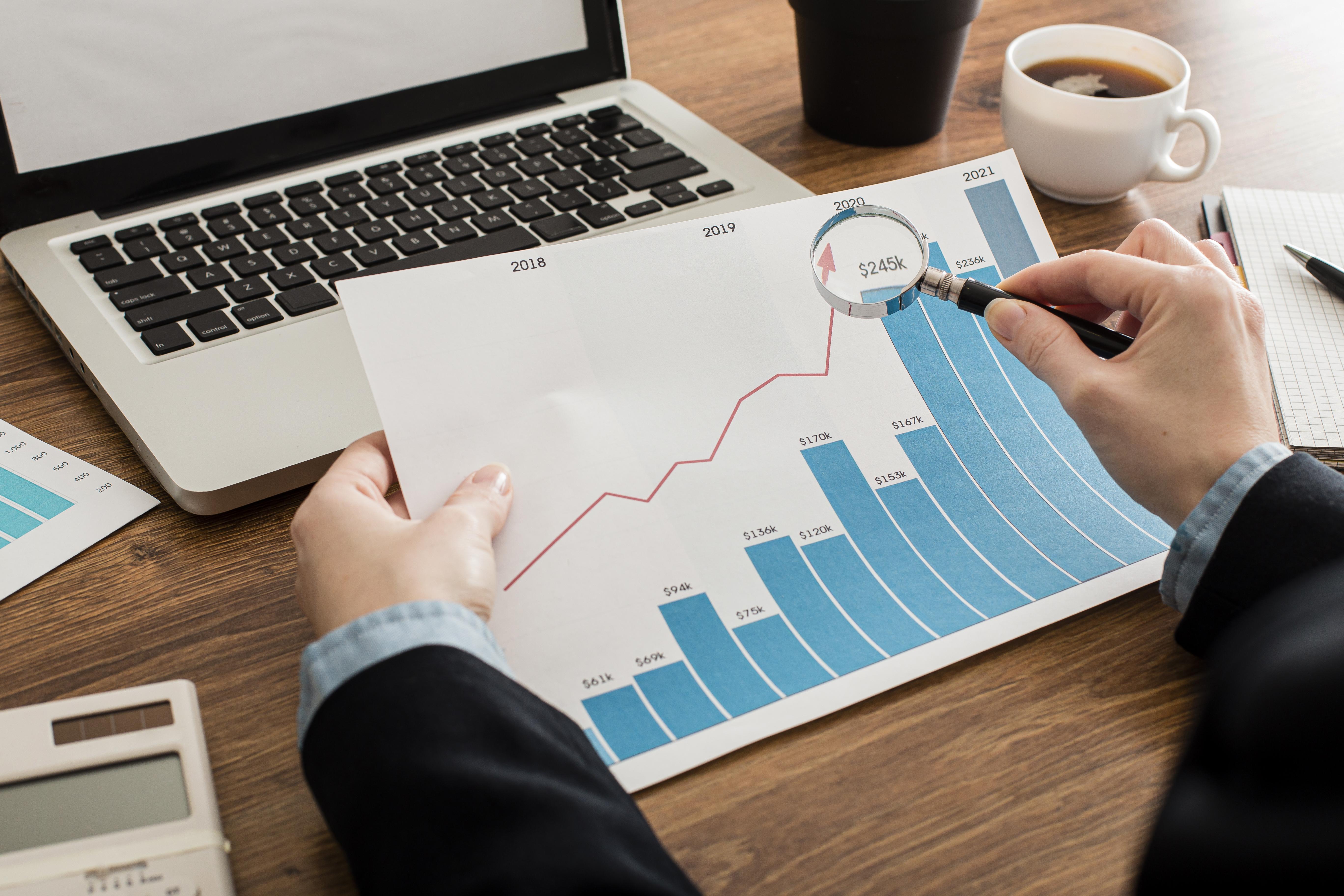 businessman-analyzing-growth-chart-office.jpg