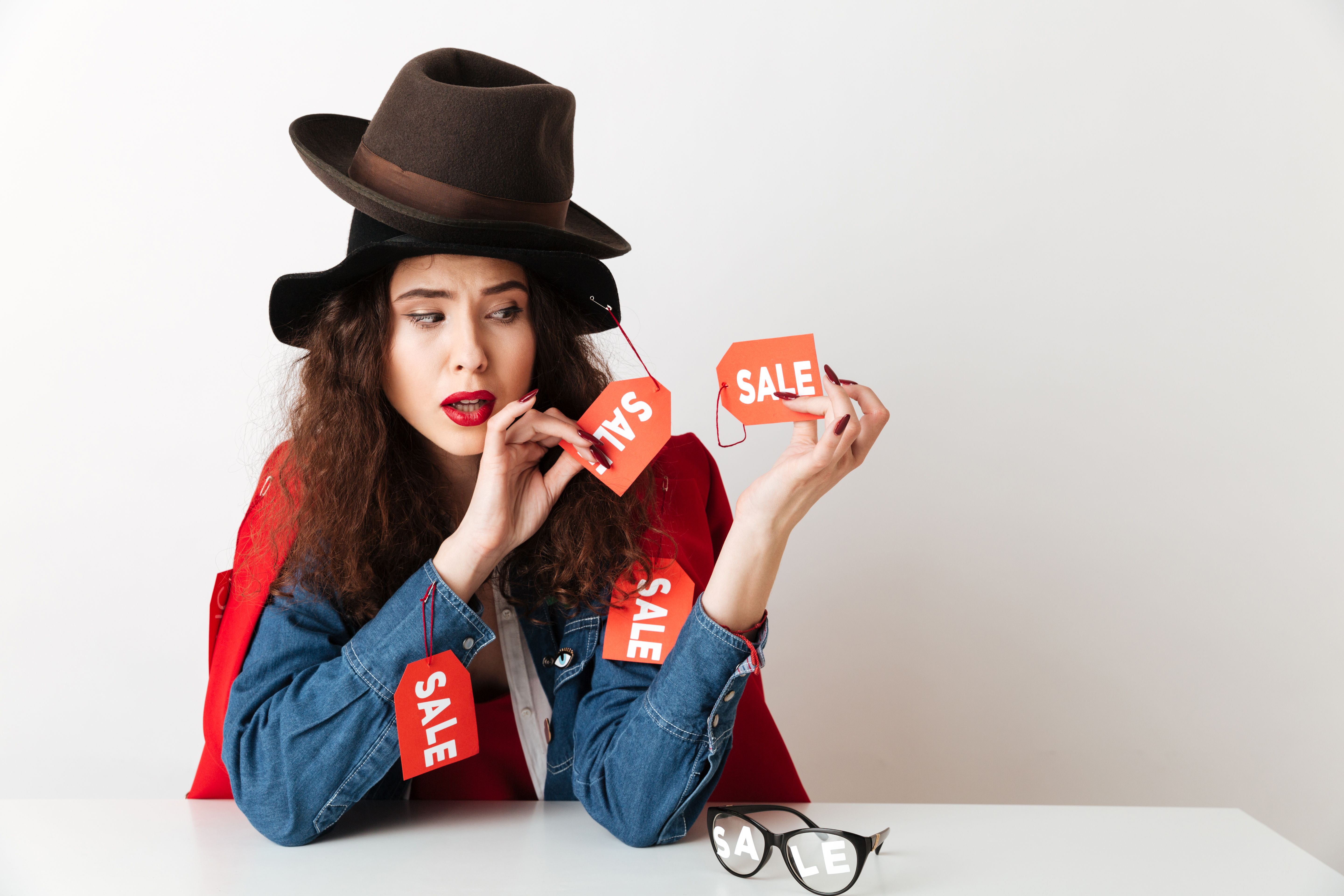 concentrated-sale-shopping-lady-wearing-sale-signs.jpg