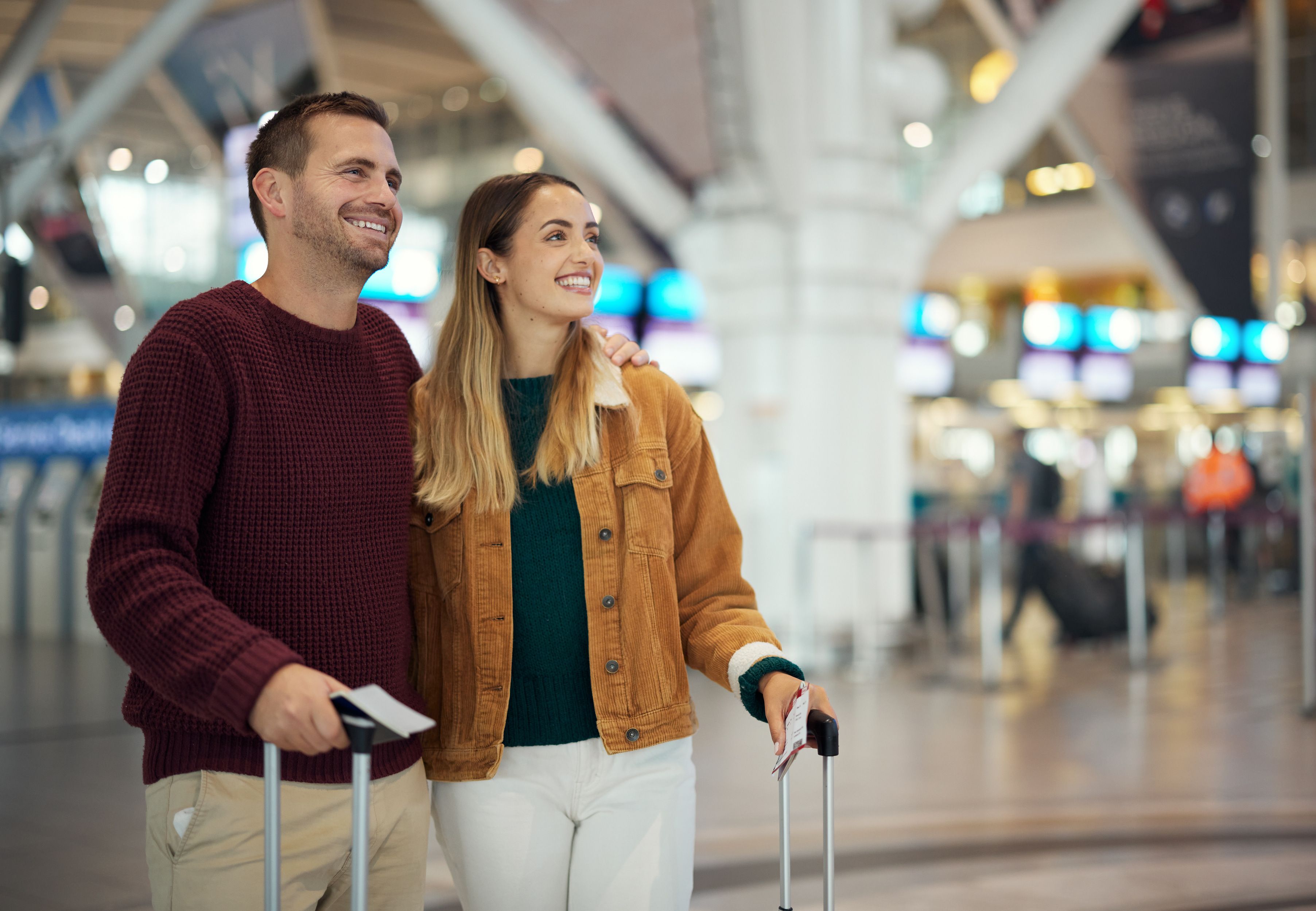 couple-airport-travel-together-holiday-overseas-with-adventure-love-romantic-getaway-with-happy-people-man-woman-luggage-ready-board-airplane-flight-trip-with-mockup-space.jpg