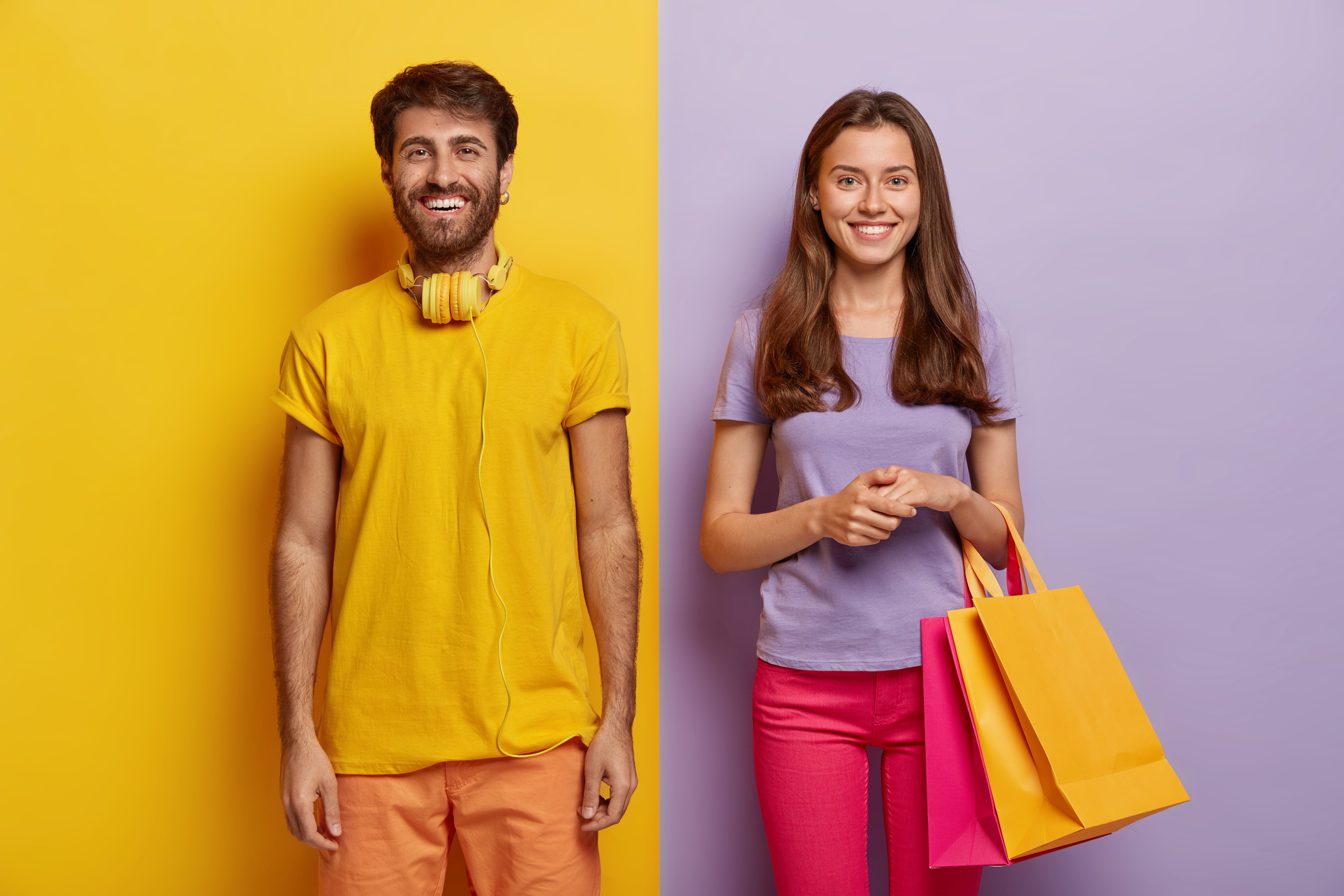 happy-couple-enjoy-weekend-make-purchasing-hold-shoppings-bags-wears-bright-outfit-being-high-spirit.jpg