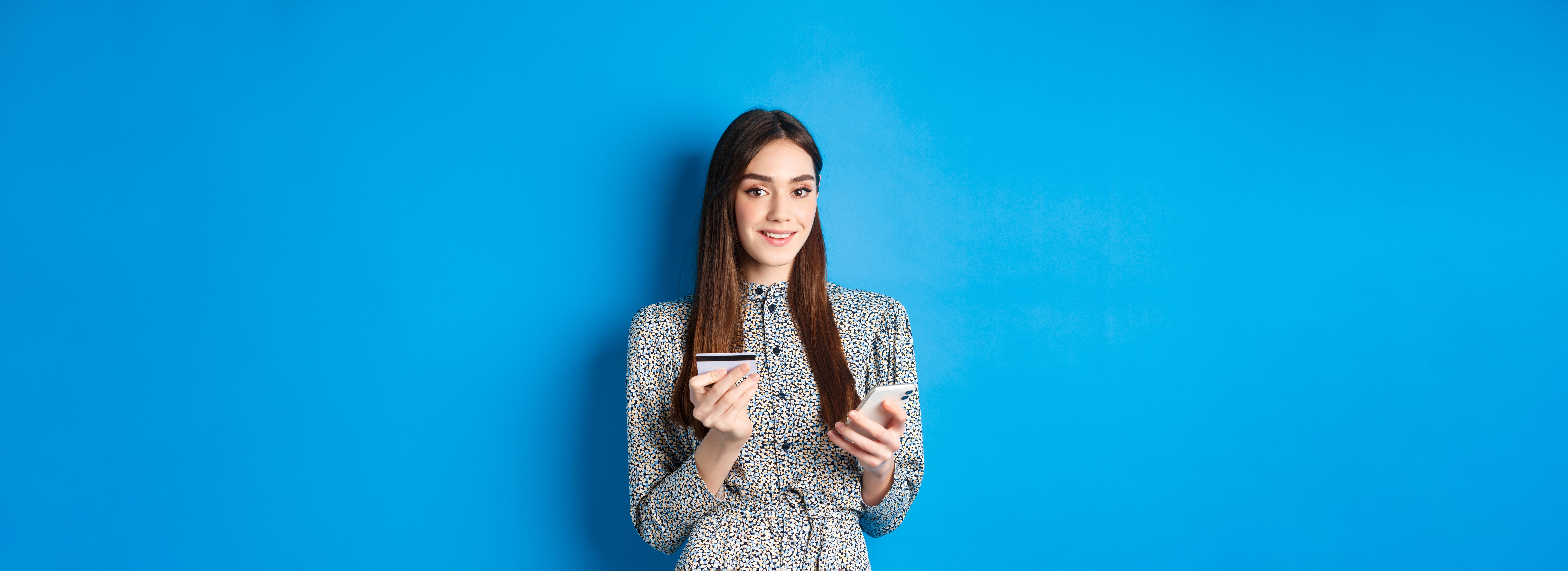 online-shopping-happy-smiling-woman-buying-app-holding-smartphone-plastic-credit-card-blue-ba.jpg