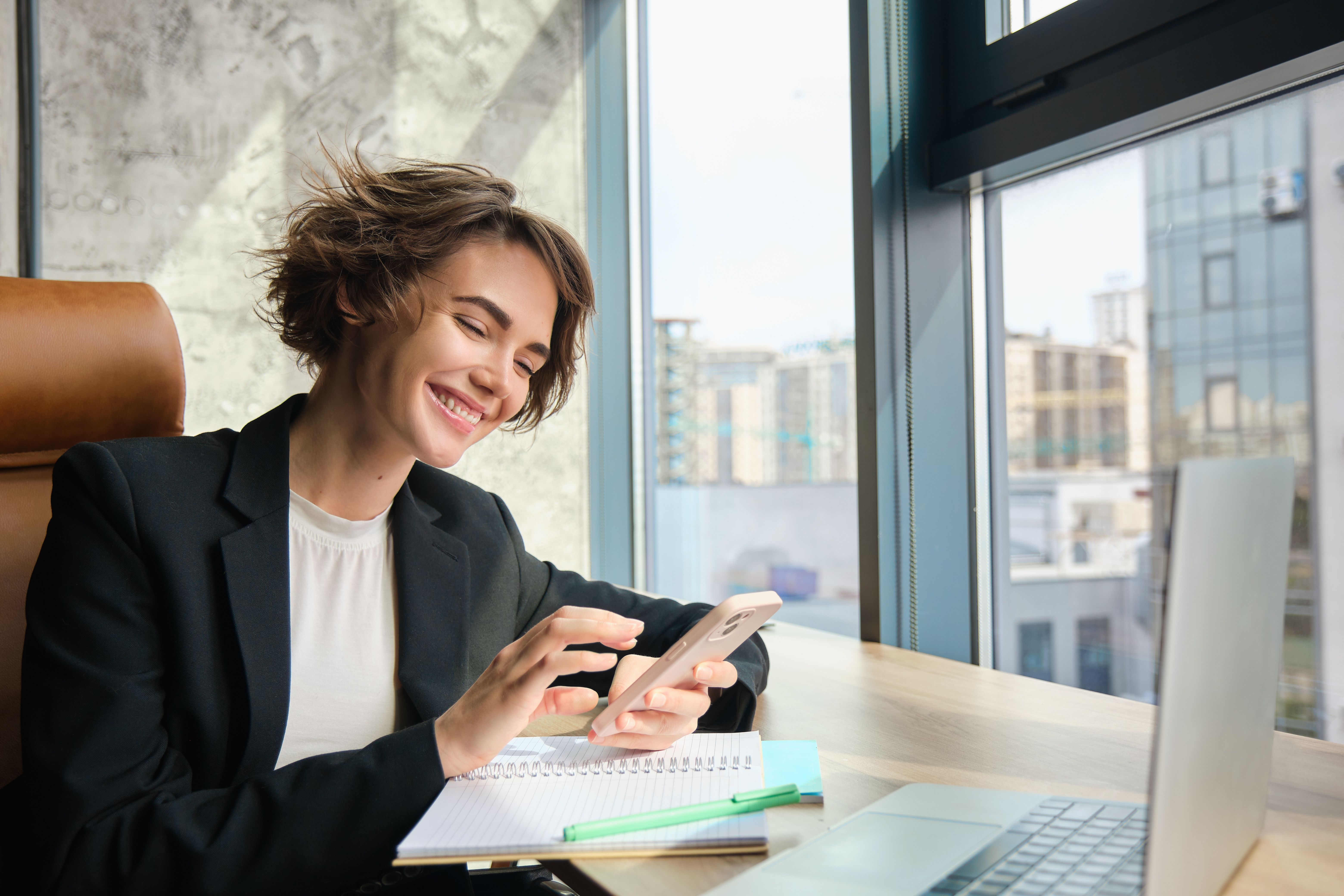 portrait-young-professional-saleswoman-businesswoman-suit-sitting-office-her-company.jpg