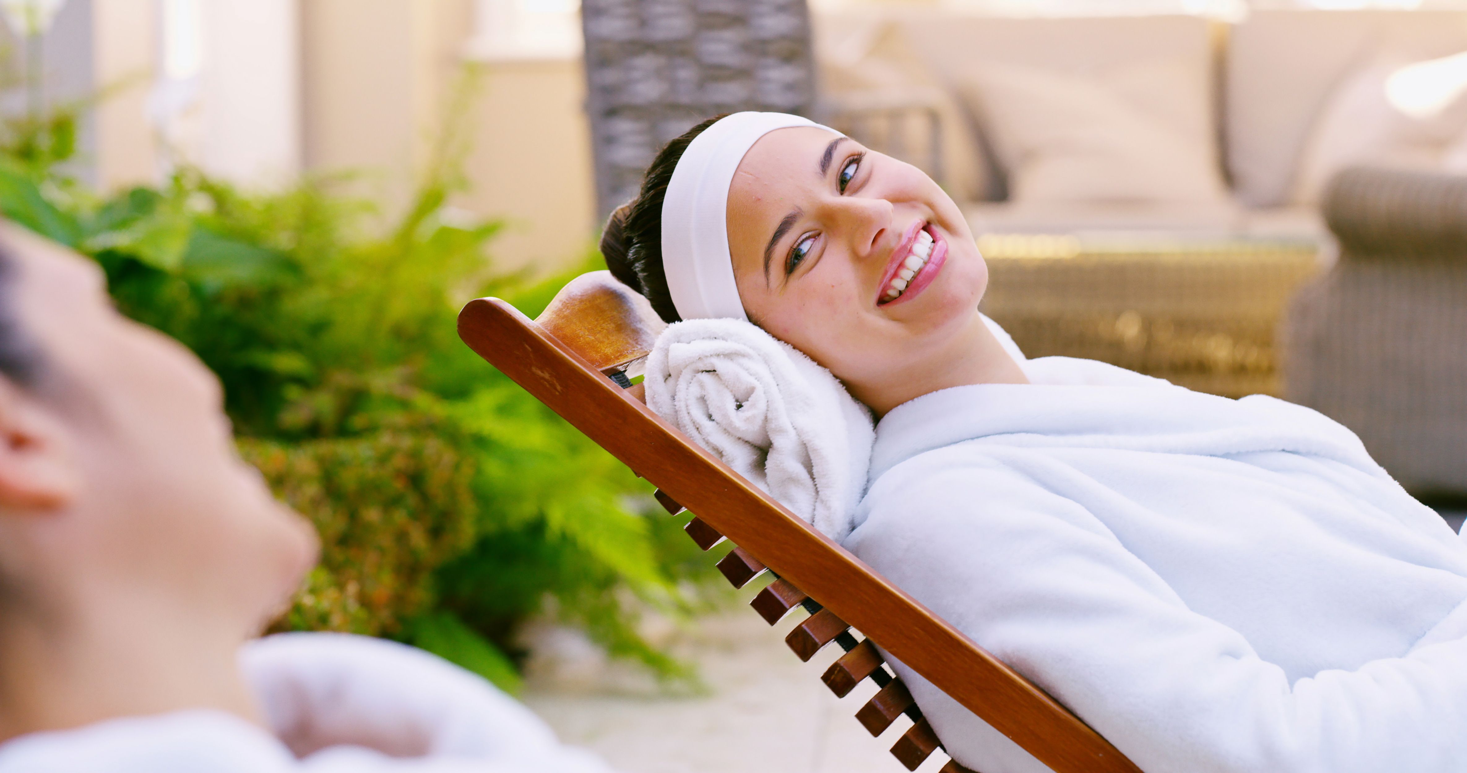 women-friends-happy-spa-with-relaxing-massage-bonding-self-care-luxury-people-chair-smile-satisfied-with-conversation-resort-hotel-vacation-break-peace.jpg
